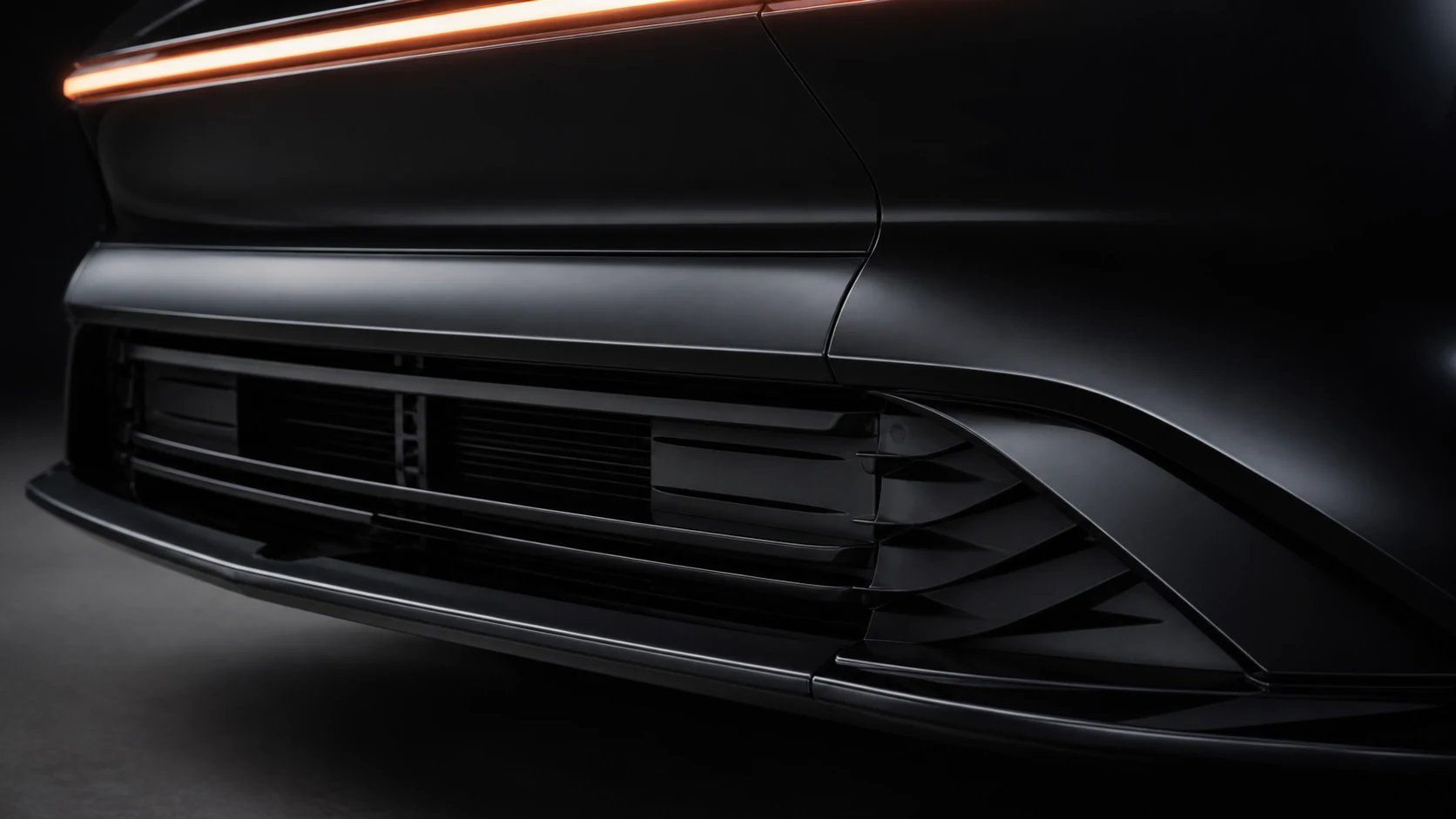 Close view of the Arcen's active lower grille shutter and front air intake