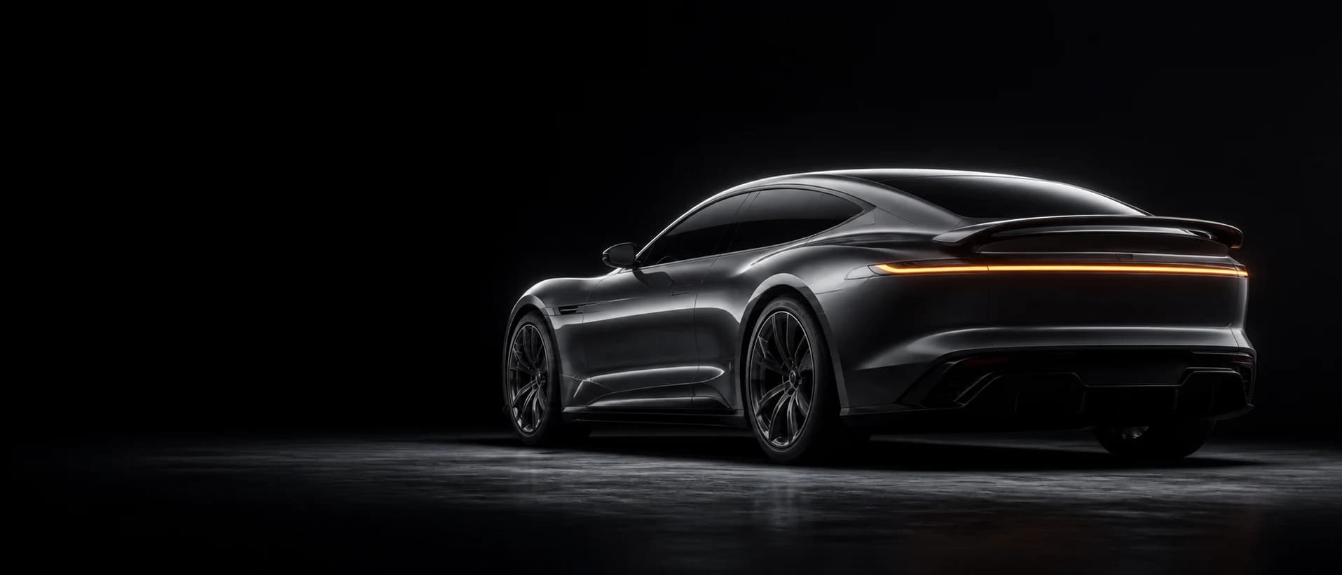 The Veltrix Torren GT grand tourer in a dark studio, a single hard light defining its rear haunch